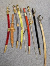 Collection of Nine Assorted Ceremonial Swords, Sabers, and Daggers