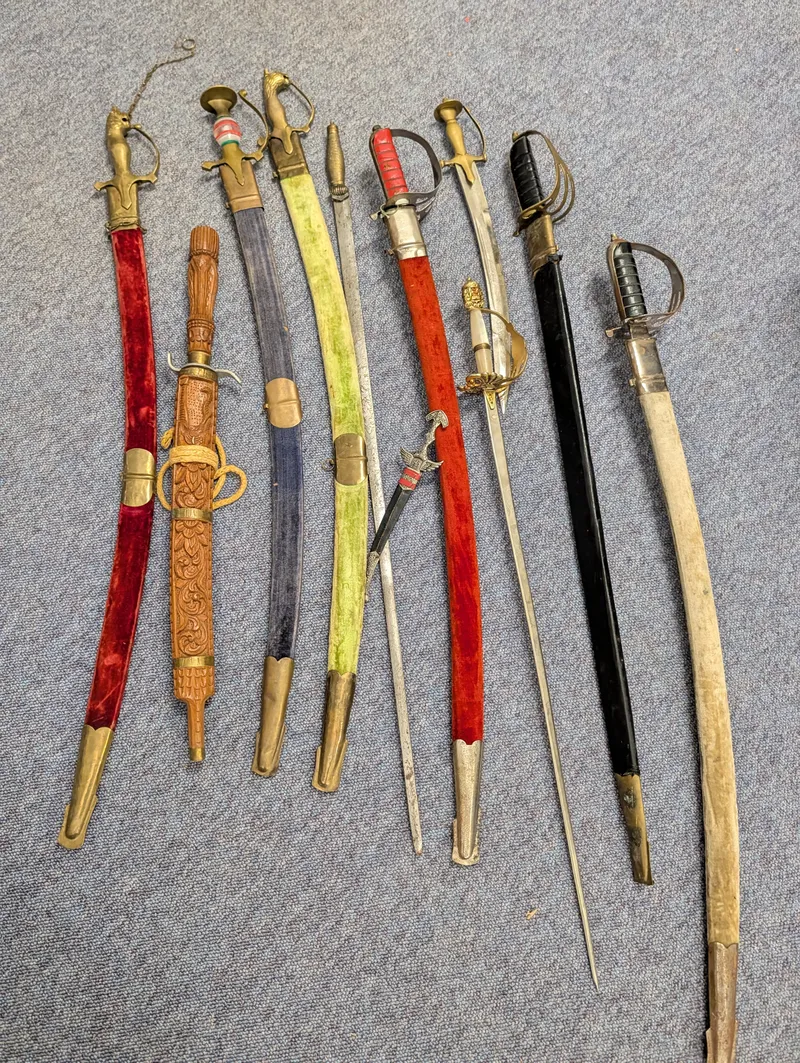 Collection of Nine Assorted Ceremonial Swords, Sabers, and Daggers