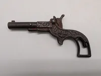 Antik støbejerns legetøjspistol med patentdatoer fra 1887