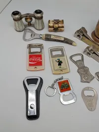 Vintage Collectibles Lot including Coca-Cola Openers and Matryoshka Dolls