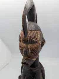 West African Hand-Carved Janus-Faced Wooden Figural Sculpture