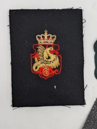 Samling af danske militære emblemer