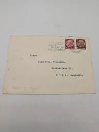 Tysk postkuvert fra 1930'erne med Hindenburg-frimærker og propagandamærkat