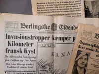 Collection of WWII Danish Newspapers, Photo Album, and Krigsbilleder Booklet