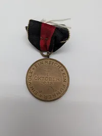 Tysk Sudetenland-medalje fra 1938 med originalt bånd