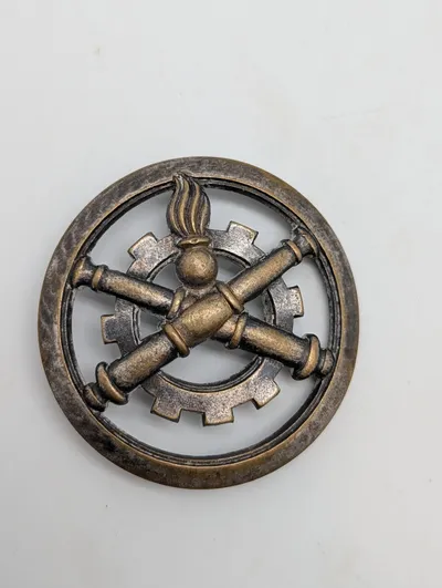 Fransk militæremblem for Materielkorpset (Le Matériel)