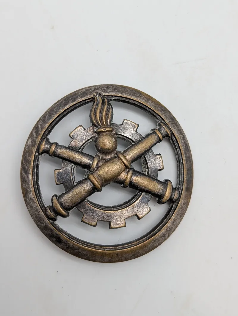 Fransk militæremblem for Materielkorpset (Le Matériel)