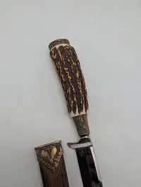 Othello Solingen jagtkniv med hjortetaksgreb og dekoreret skede
