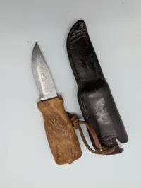Helle Norway Stainless Steel Fixed Blade Knife with Curly Birch Handle