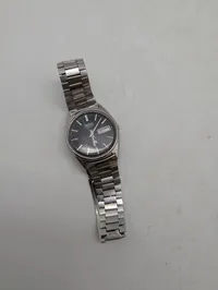 To vintage armbåndsure, herunder Seiko Quartz