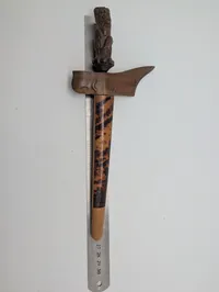 Child Indonesian Keris Dagger with Carved Figural Hardwood Hilt