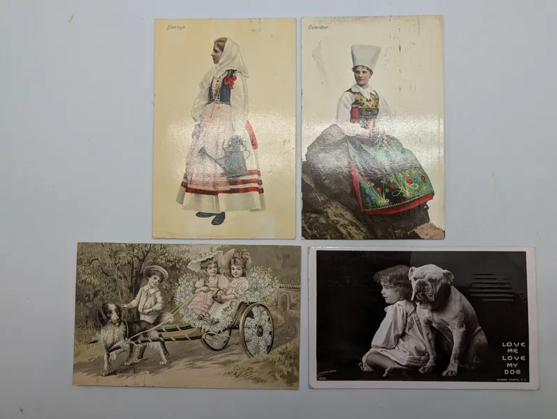 Set of Four Antique Postcards Featuring Swedish Folk Dress and Children