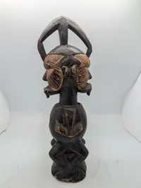 West African Hand-Carved Janus-Faced Wooden Figural Sculpture