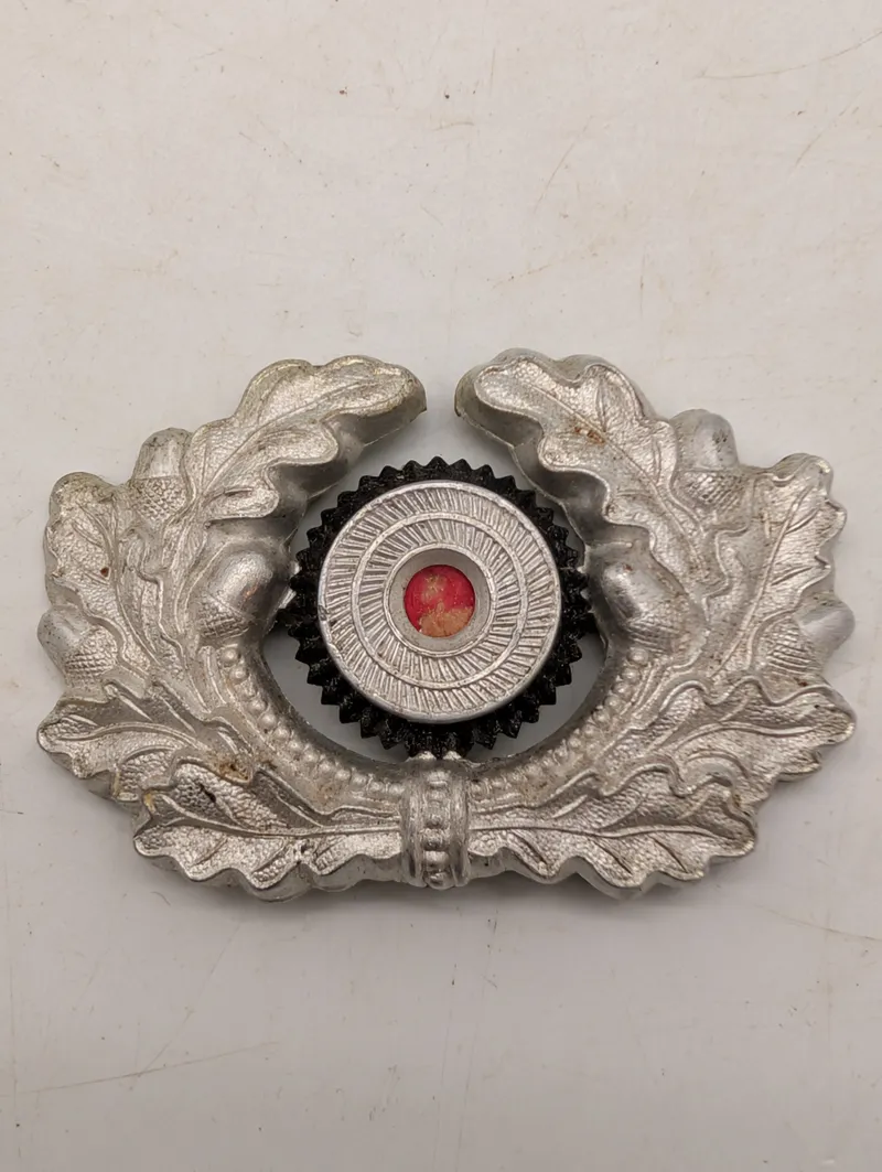 Tysk Wehrmacht Heeres-kokarde med egeløvskrans, Ges. Gesch. mærket