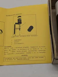 HMAK Alarmblus M/62 med tilhørende manual til Alarmmine M/87