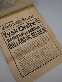 Dansk scrapbog med avisudklip fra Politiken og fotos fra 2. verdenskrig