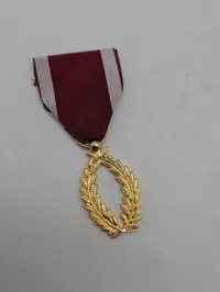 Guldtonet laurbærkrans-medalje med rød-hvidt ordensbånd Belgien 