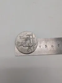 F.W. Assmann & Söhne 1. Maj 1936 Tinnie-emblem