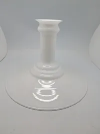 Mythos pendlen fra Holmegaard er designet af Sidse Werner. Glasskærmen er udført i opal hvid. 