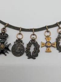 Antik miniature ordenskæde med syv europæiske ordener og medaljer