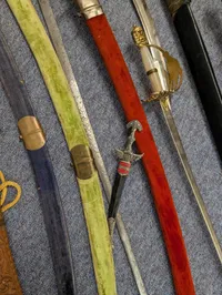 Collection of Nine Assorted Ceremonial Swords, Sabers, and Daggers