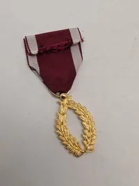Guldtonet laurbærkrans-medalje med rød-hvidt ordensbånd Belgien 