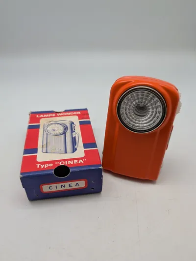 Vintage Wonder Cinea lommelygte i orange metal med original æske