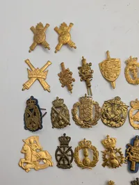 Samling af danske militære Regimentsmærker 