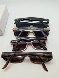 Samling af fire par Ray-Ban solbriller med Dior æske