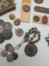 Collection of Vintage Danish Military and Commemorative Medals, Pins, and Coins