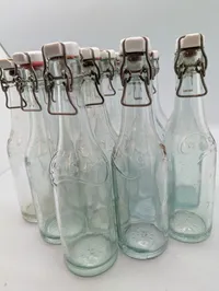 Samling af 13 antikke Carlsberg flasker med patentprop