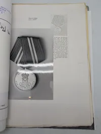 Dansk ordenshistorisk brev og bånd vedrørende Fortjensttegnet
