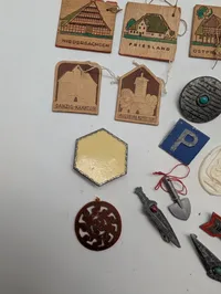 Collection of Vintage German Winterhilfswerk (WHW) Donation Tokens