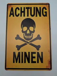 Achtung Minen metalskilt med kranium og korslagte knogler