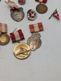 Samling af danske roning medaljer og emblemer fra Sønderjysk Kaproning