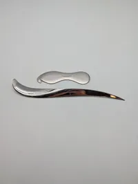 Georg Jensen og Royal Copenhagen brevåbner og flaskeåbner i rustfrit stål