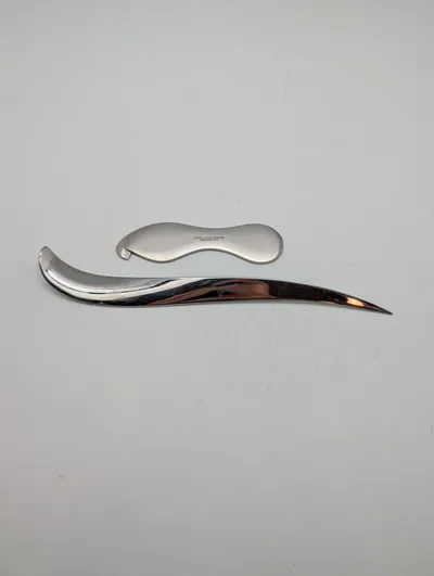 Georg Jensen og Royal Copenhagen brevåbner og flaskeåbner i rustfrit stål