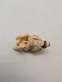 Japansk Shunga Netsuke i udskåret ben forestillende elskende par