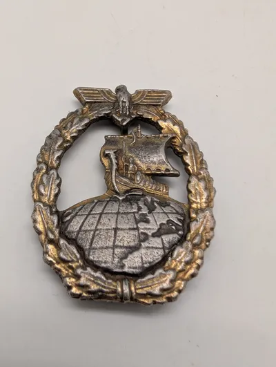 German WWII Auxiliary Cruiser War Badge POSTWAR 