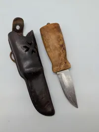 Helle Norway Stainless Steel Fixed Blade Knife with Curly Birch Handle