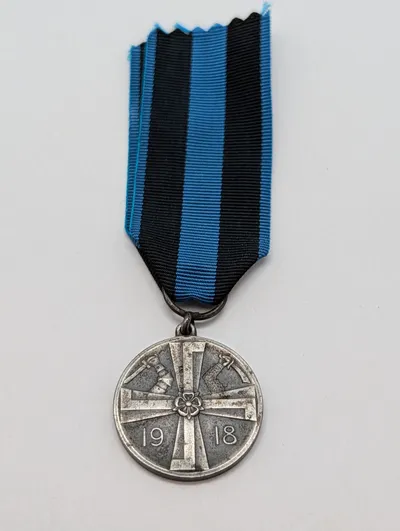 Finsk Frihedskrigs Mindemedalje 1918 med originalt bånd
