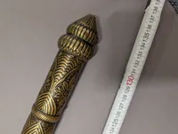 Antique Southeast Asian Dha Sword with Ornate Brass Hilt and Serrated Blade
