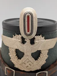 Tysk politi-shako (Tschako) fra 2. verdenskrig med ørn og kokarde, original fra 1937