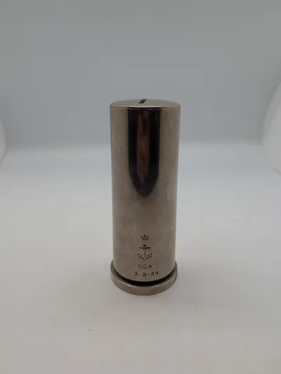 Dansk Søværn sparebøsse af metal med krone, anker og indgravering lavet af granathylster