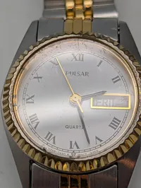 Samling af vintage smykker og Pulsar dameur
