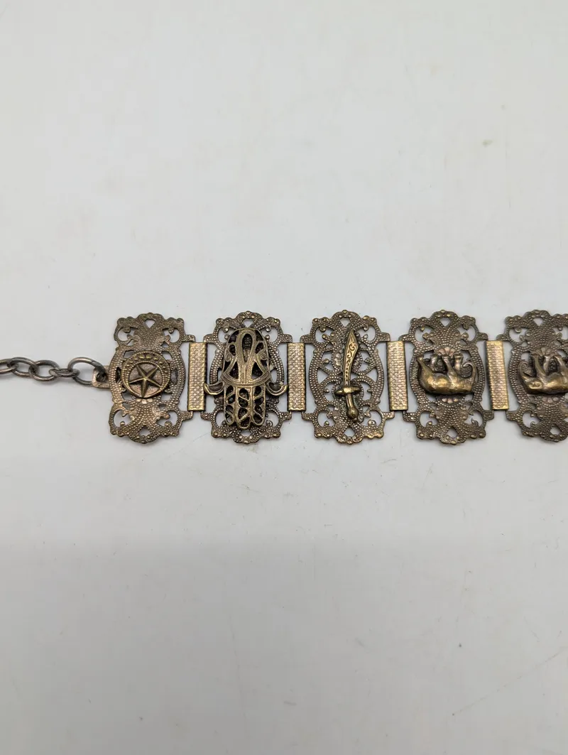Antik Mellemøstlig Panelarmbånd i Messing med Symbolske Motiver