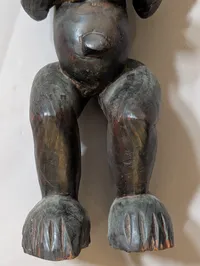 African Carved Dark Wood Fertility Figure with Brass Eye Inlays