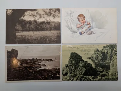 Set of Four Vintage Postcards Featuring Landscapes and Illustration