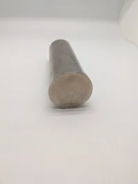 Dansk Søværn sparebøsse af metal med krone, anker og indgravering lavet af granathylster 