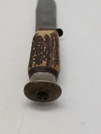 Vintage jagtkniv med hjortetaksgreb og læderskede